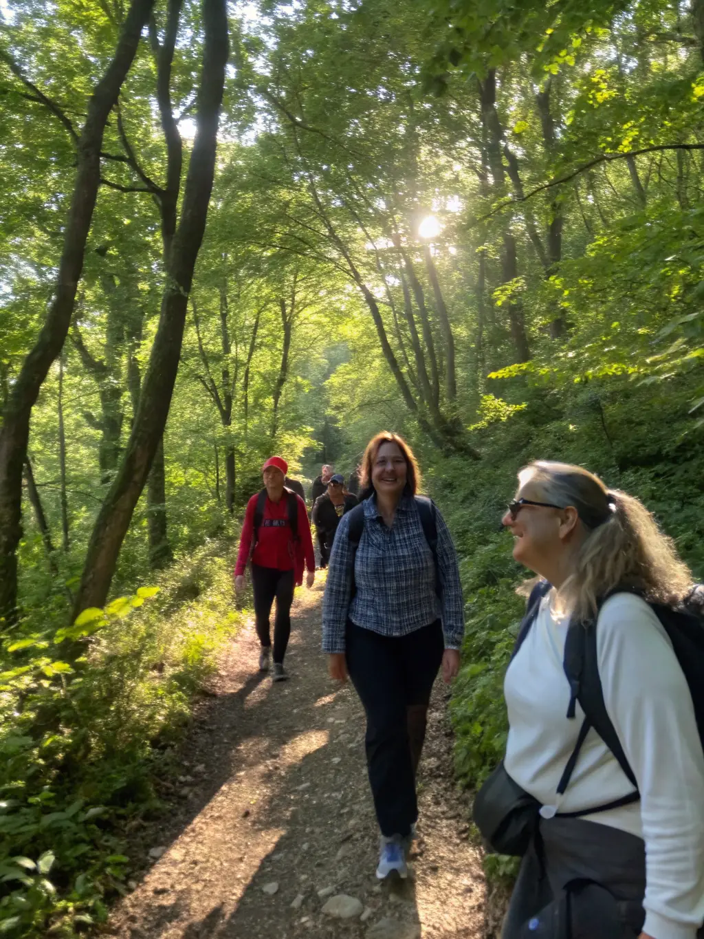 An exciting image of people hiking through a scenic trail, showcasing the club's outdoor adventure program.